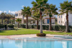 Calmaliving Seaside apartments with pool